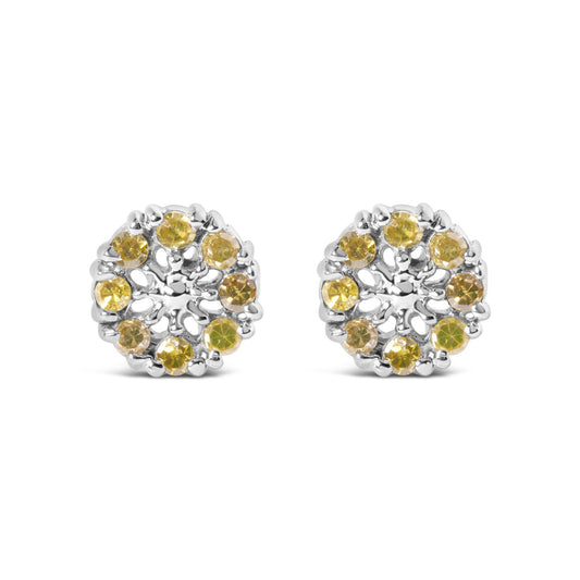 Front angle view of white metal round earrings with yellow round gemstones in prong settings arranged in a circular pattern.