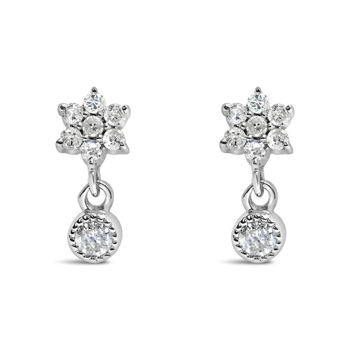Front view of white metal earrings with round white gemstones in a prong setting, featuring a floral cluster and a single dangling gemstone.