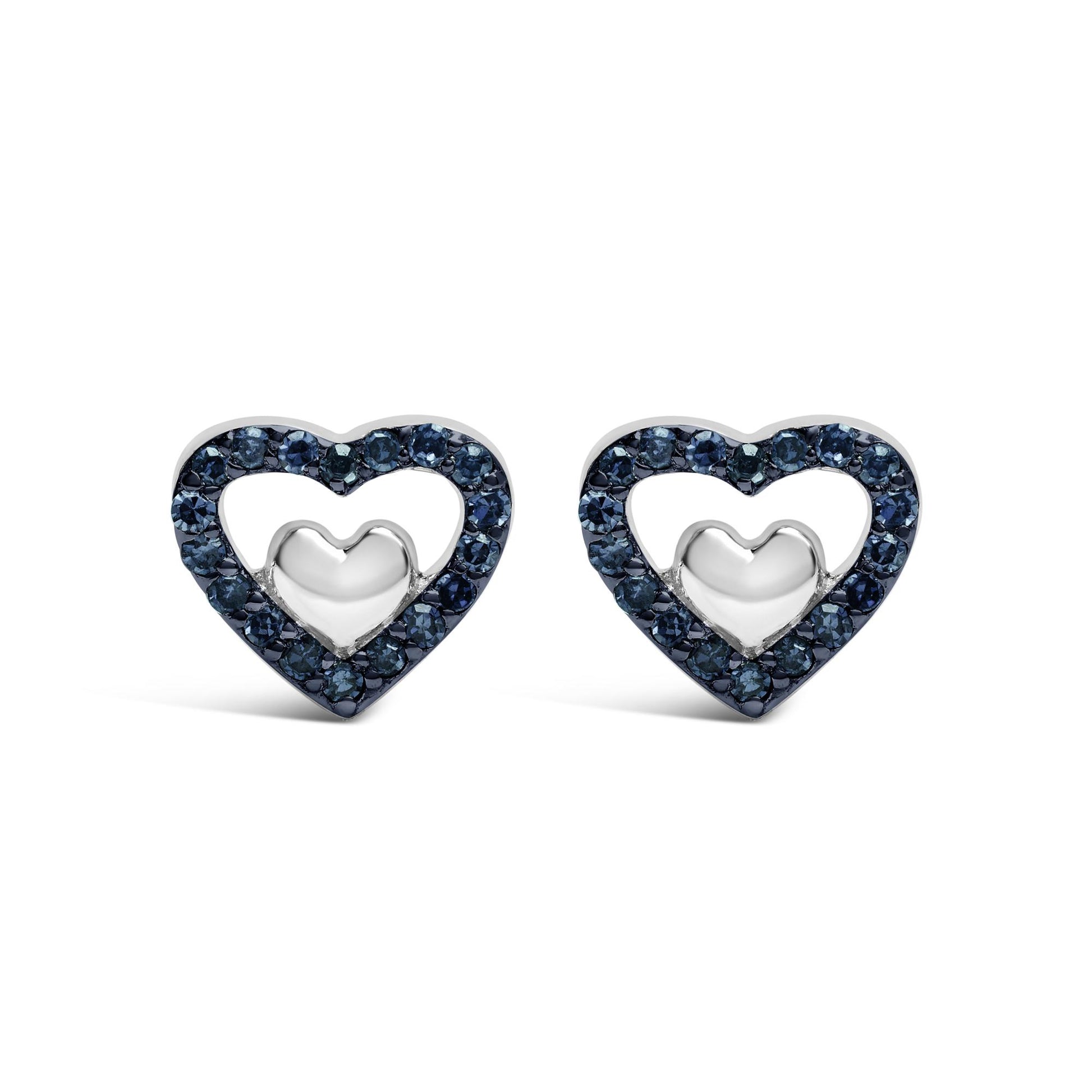 Front view of a pair of white metal heart-shaped earrings featuring an outline of blue round gemstones in prong settings.
