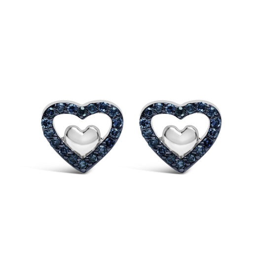 Front view of a pair of white metal heart-shaped earrings featuring an outline of blue round gemstones in prong settings.