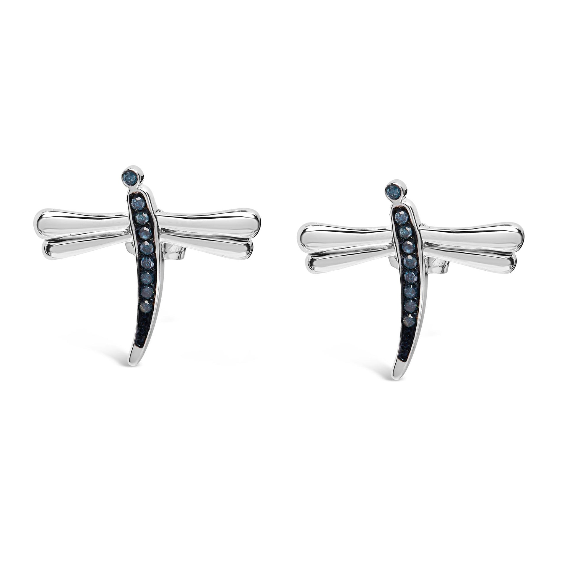 Pair of white metal dragonfly-shaped earrings with prong-set round blue gemstones, front-facing angle.