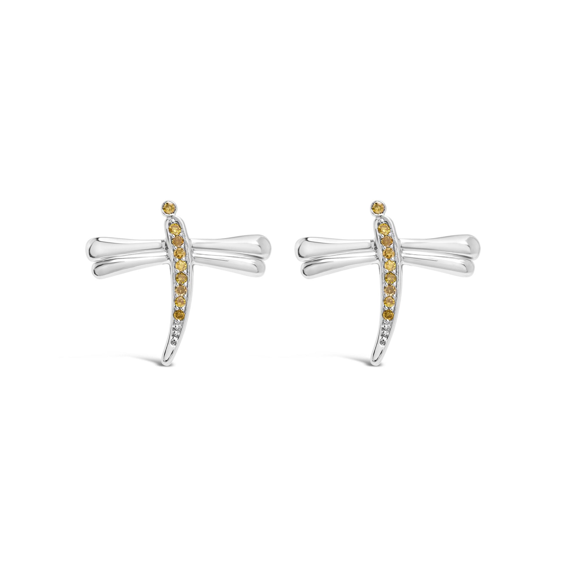 Pair of white metal earrings shaped like dragonflies with yellow round gemstones in prong settings, shown from the front on a white background.