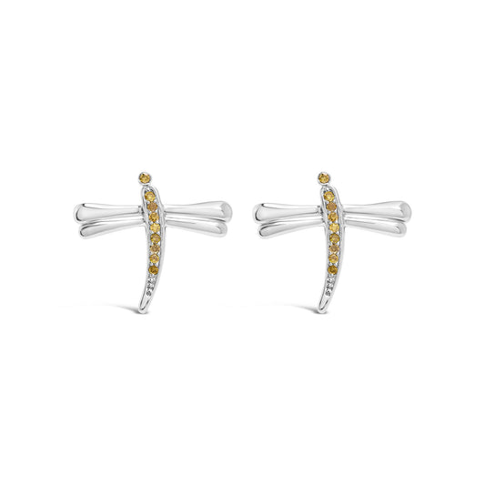 Pair of white metal earrings shaped like dragonflies with yellow round gemstones in prong settings, shown from the front on a white background.