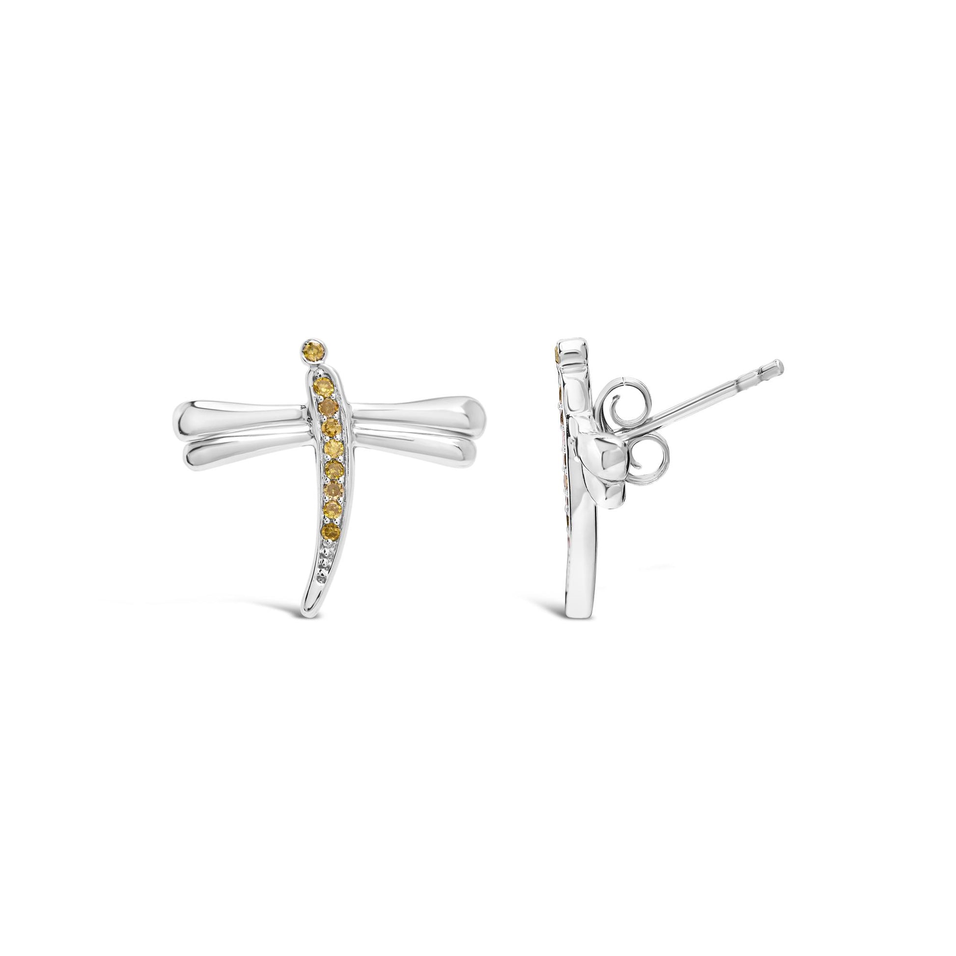 Front and side view of white metal dragonfly-shaped earrings with a row of yellow round gemstones in prong settings along the body.