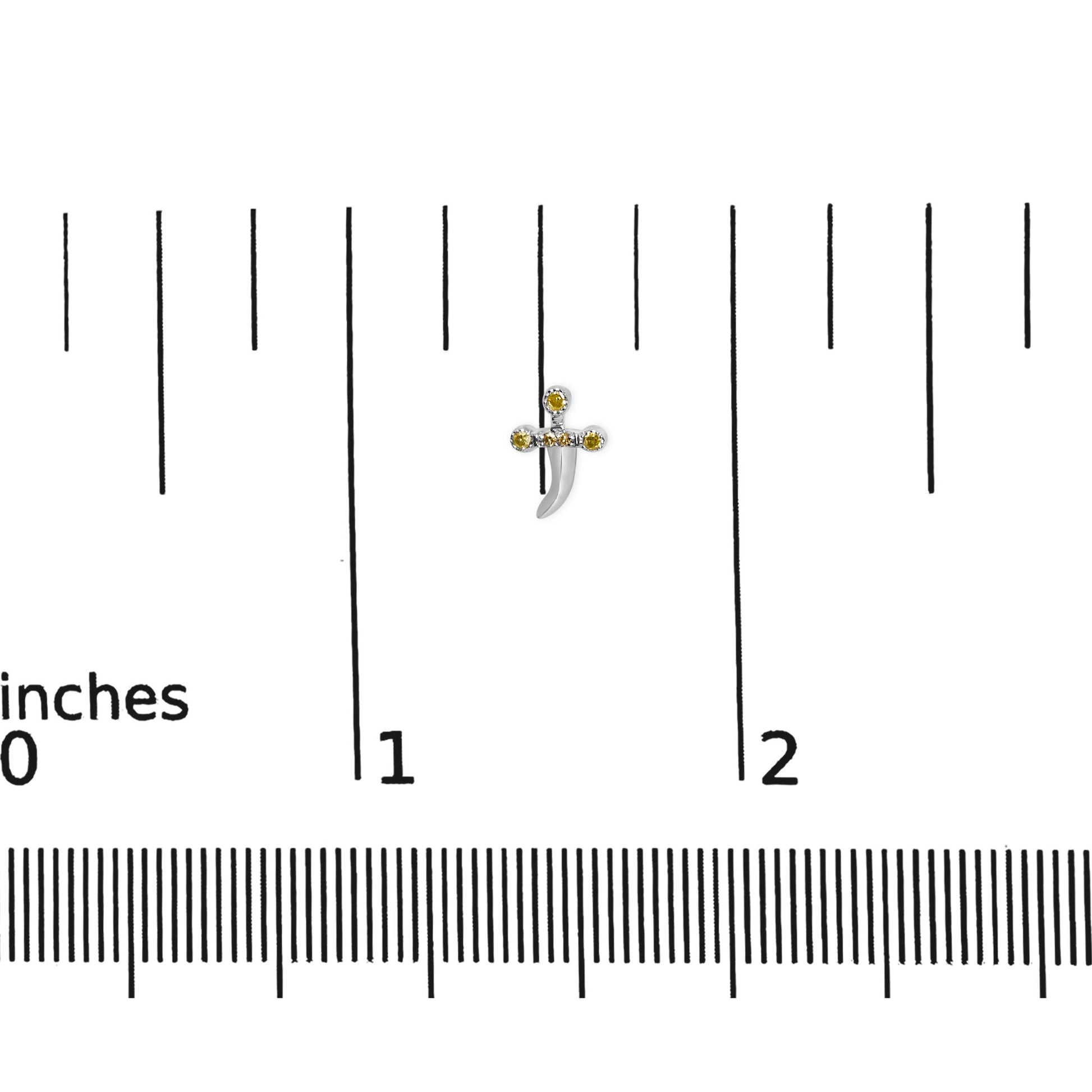 White metal earring with yellow round gemstones in prong setting, shown on a ruler for size reference, front-facing angle.