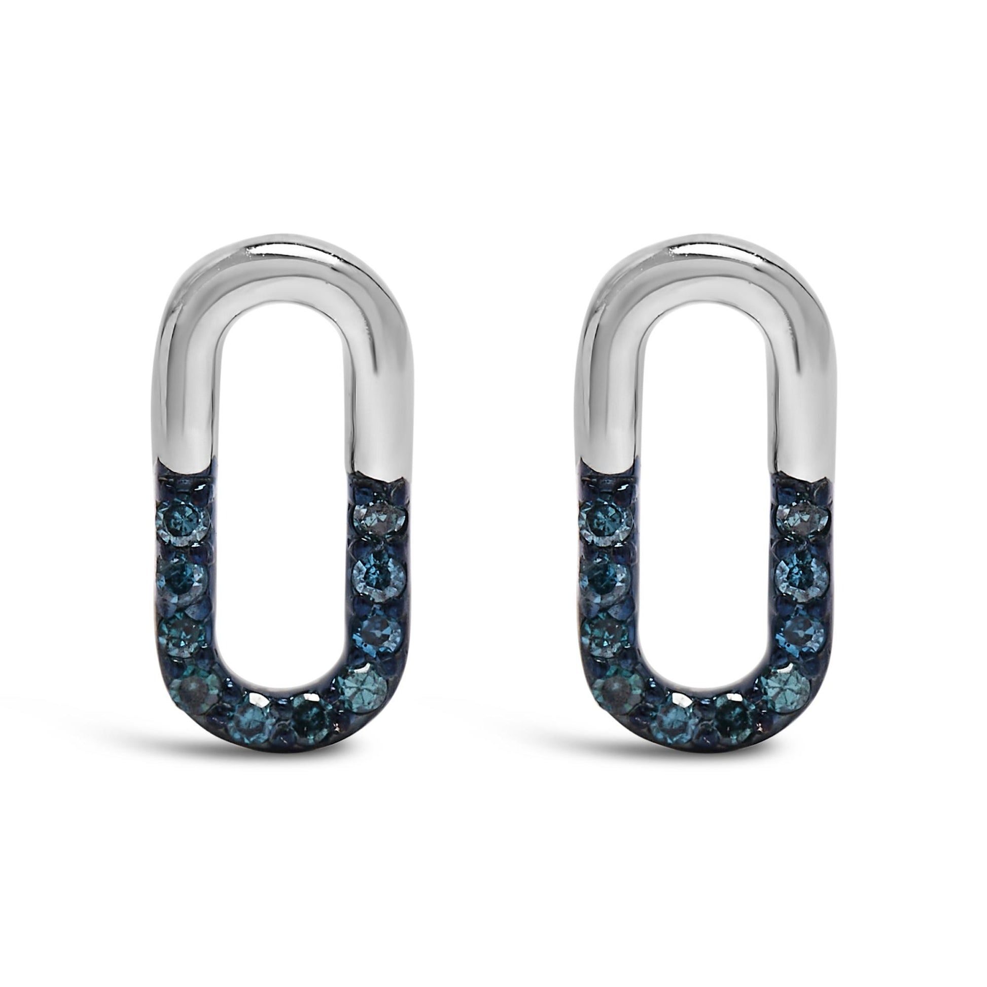 Front view of a pair of white metal oval-shaped earrings featuring blue round gemstones set in prongs along the lower half.