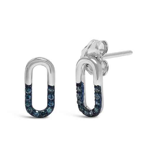 Close-up front and side view of white metal oval-shaped stud earrings with prong-set round blue gemstones on the lower half.
