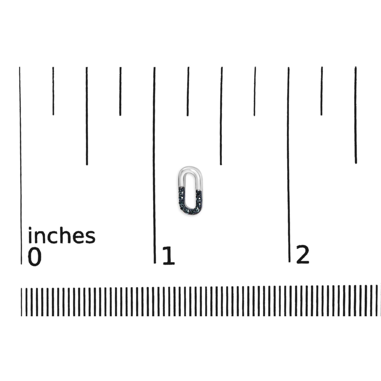 Close-up front view of small white metal earring partially encrusted with round blue gemstones, placed on a ruler for size reference.