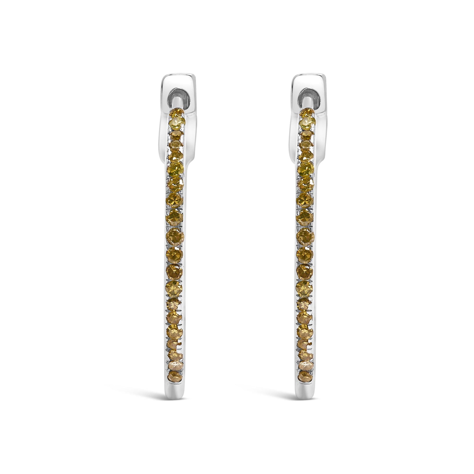 Front view of white metal hoop earrings set with round yellow gemstones in prong settings.