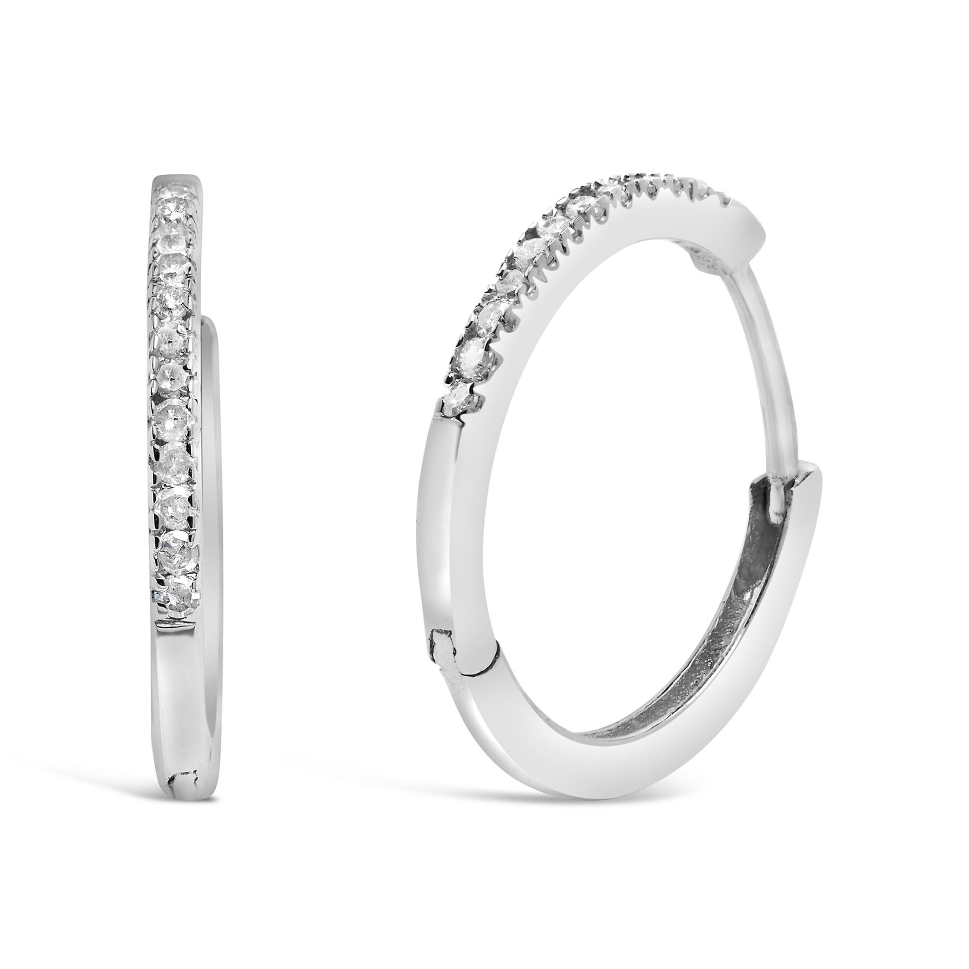 Pair of white metal hoop earrings with round white gemstones in prong settings, shown from front and side angles.