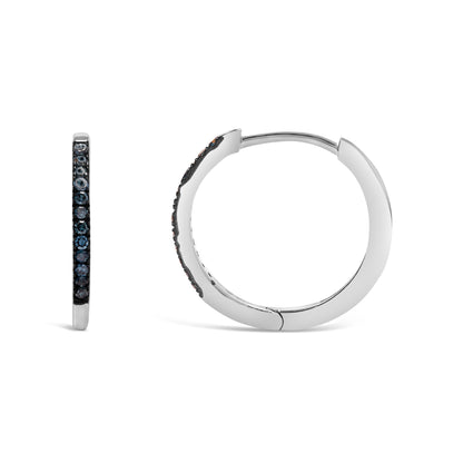 White metal hoop earrings with prong-set blue round gemstones, shown from side and front angles on a white background.