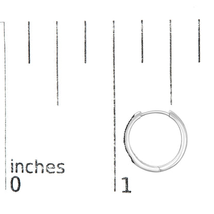 White metal hoop earring with prong-set blue round gemstones on the side, shown flat on a ruler for size reference.