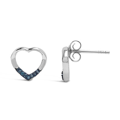 White metal heart-shaped stud earrings with blue round gemstones in prong setting on the lower curve, shown from front and side angles.