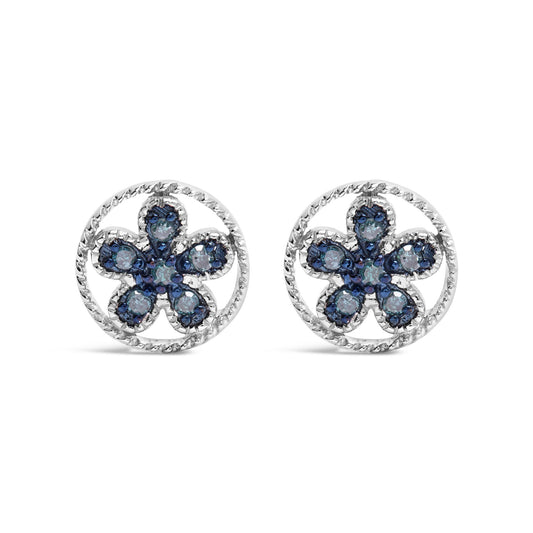 Front view of white metal earrings with circular twisted borders and flower-shaped clusters of blue round prong-set gemstones.