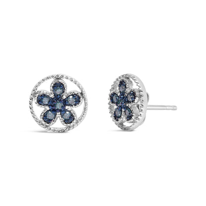 Pair of white metal round stud earrings with blue round gemstones in prong settings arranged in a flower shape, shown from front and side angles.