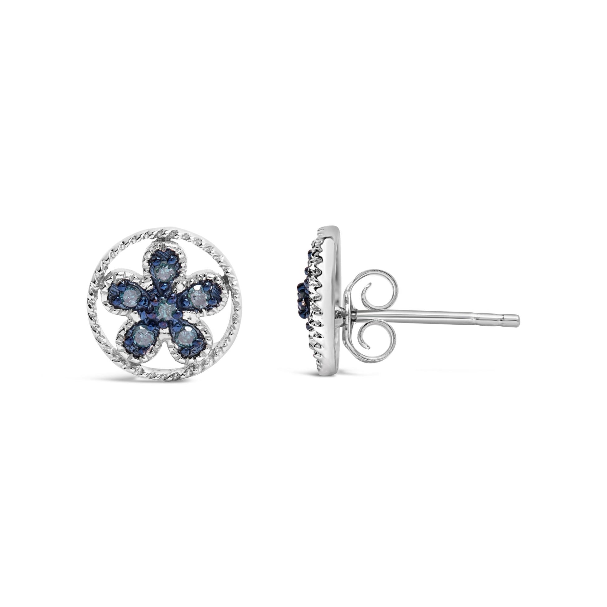 Front and side view of white metal stud earrings with a flower design featuring round blue gemstones in prong settings.