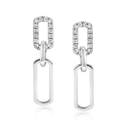 Front view of white metal earrings with two linked rectangular shapes, the top rectangles adorned with round prong-set white gemstones.