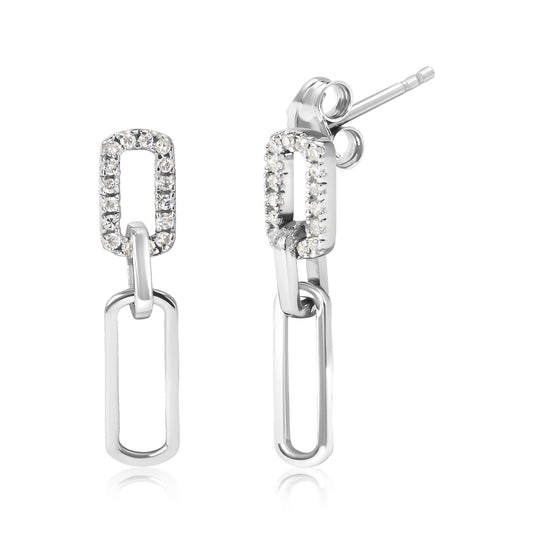 Front and side view of white metal dangle earrings with linked rectangular shapes, one rectangular link embellished with white round gemstones in prong setting.