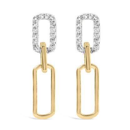 Front angle of yellow metal dangle earrings with two linked rectangular shapes, the top rectangle is adorned with white round gemstones in a prong setting.