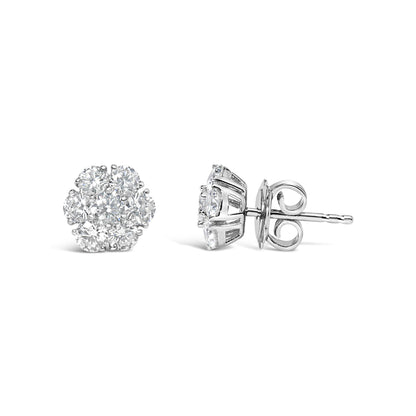 Pair of white metal round-shaped prong-set white gemstone cluster stud earrings shown from front and side angles.
