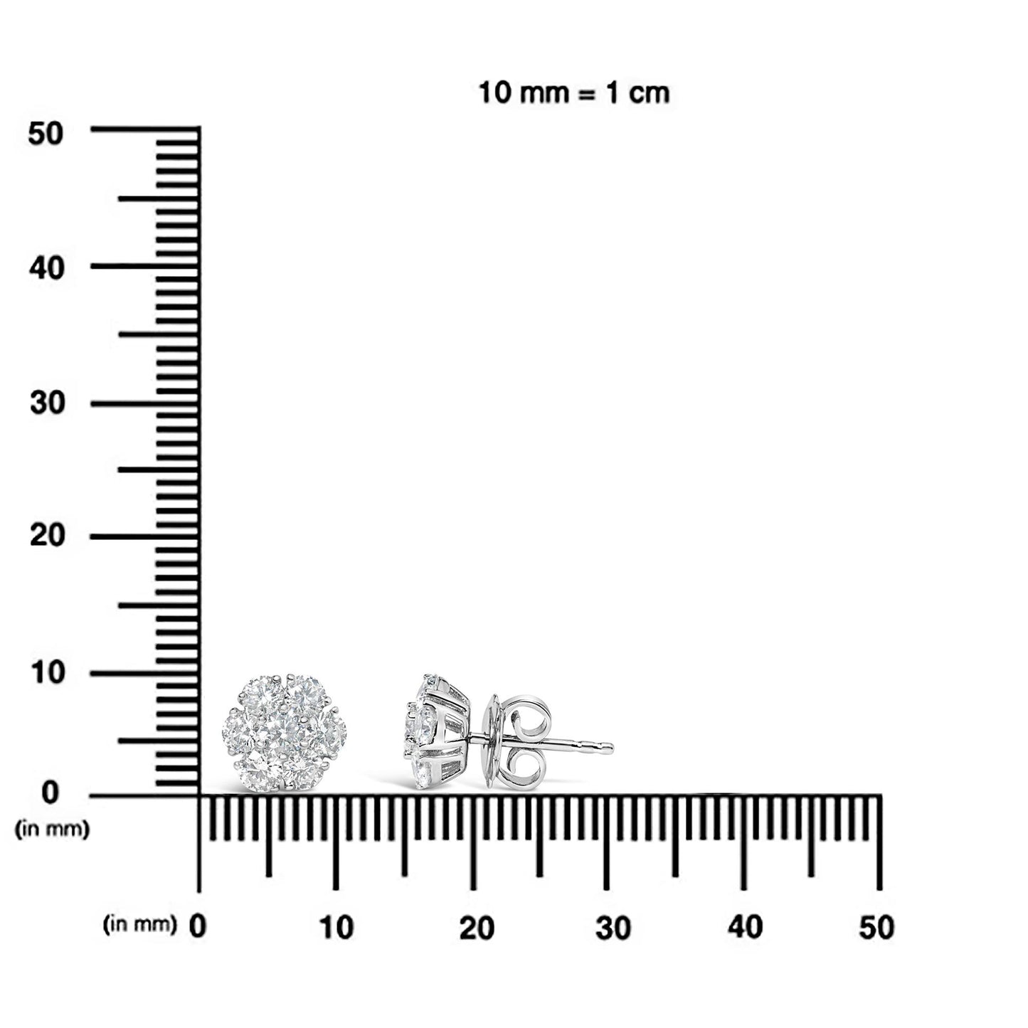 Pair of white metal stud earrings with round white gemstones in a prong setting, shown from front and side on a ruler for size reference.