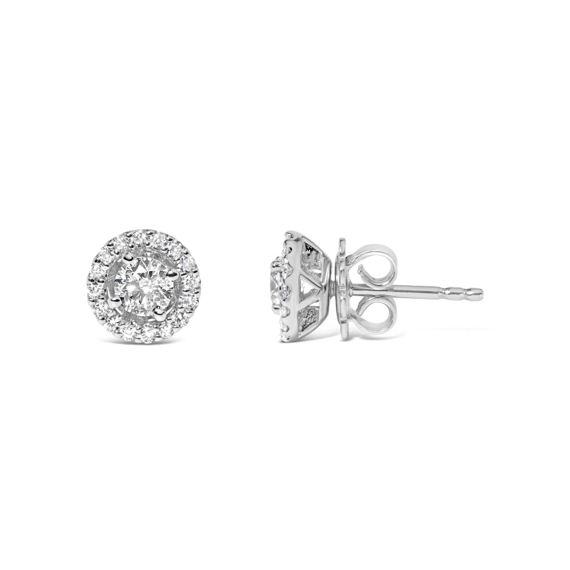Pair of white metal stud earrings with round white gemstones in prong settings, shown from front and side angles.