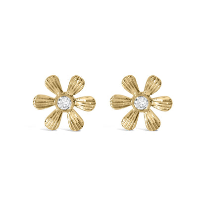 Pair of yellow metal flower-shaped earrings with textured petals and a round white gemstone in prong setting at the center, front-facing angle.