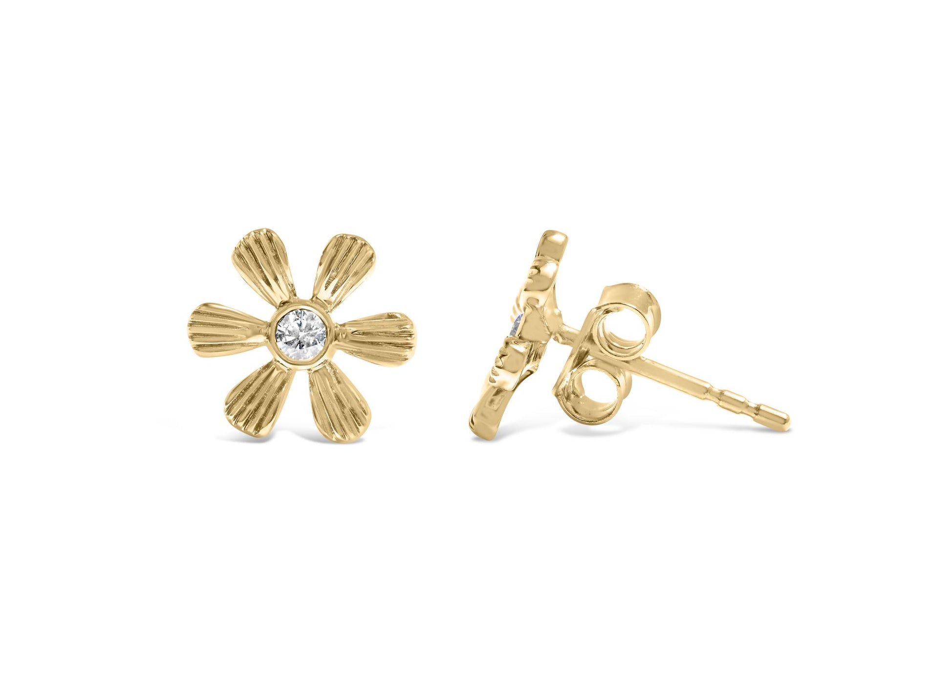Pair of yellow metal flower-shaped stud earrings with a white round gemstone center, one shown front-facing and the other at side angle.