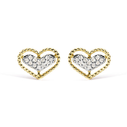 Front view of a pair of yellow metal heart-shaped earrings with inner heart filled with white round gemstones in prong settings.