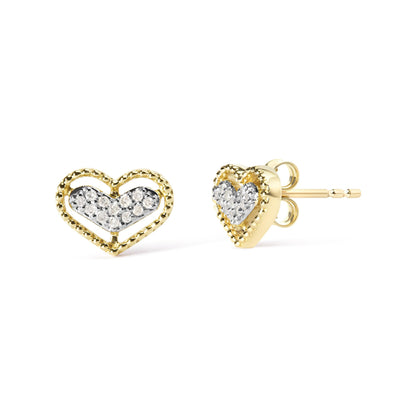 Pair of yellow metal heart-shaped earrings with white gemstones in prong setting, shown from front and side angles on a white background.