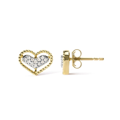 Pair of yellow metal heart-shaped stud earrings with white round gemstones in prong settings, shown front and side angles on a white background.