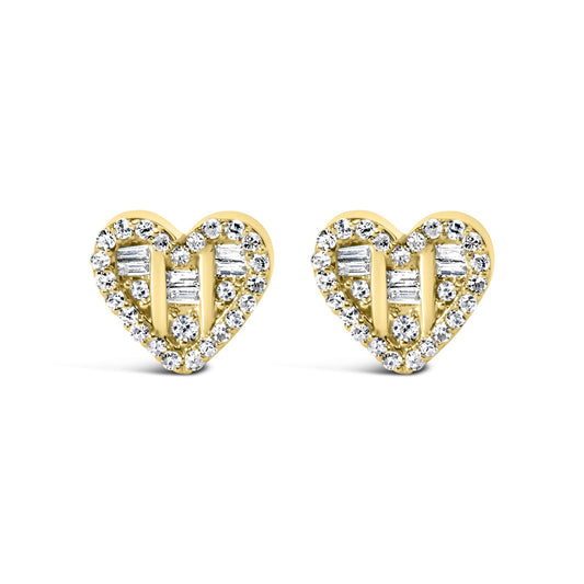 Front angle view of yellow heart-shaped stud earrings with round and baguette-shaped white gemstones in prong and channel settings.