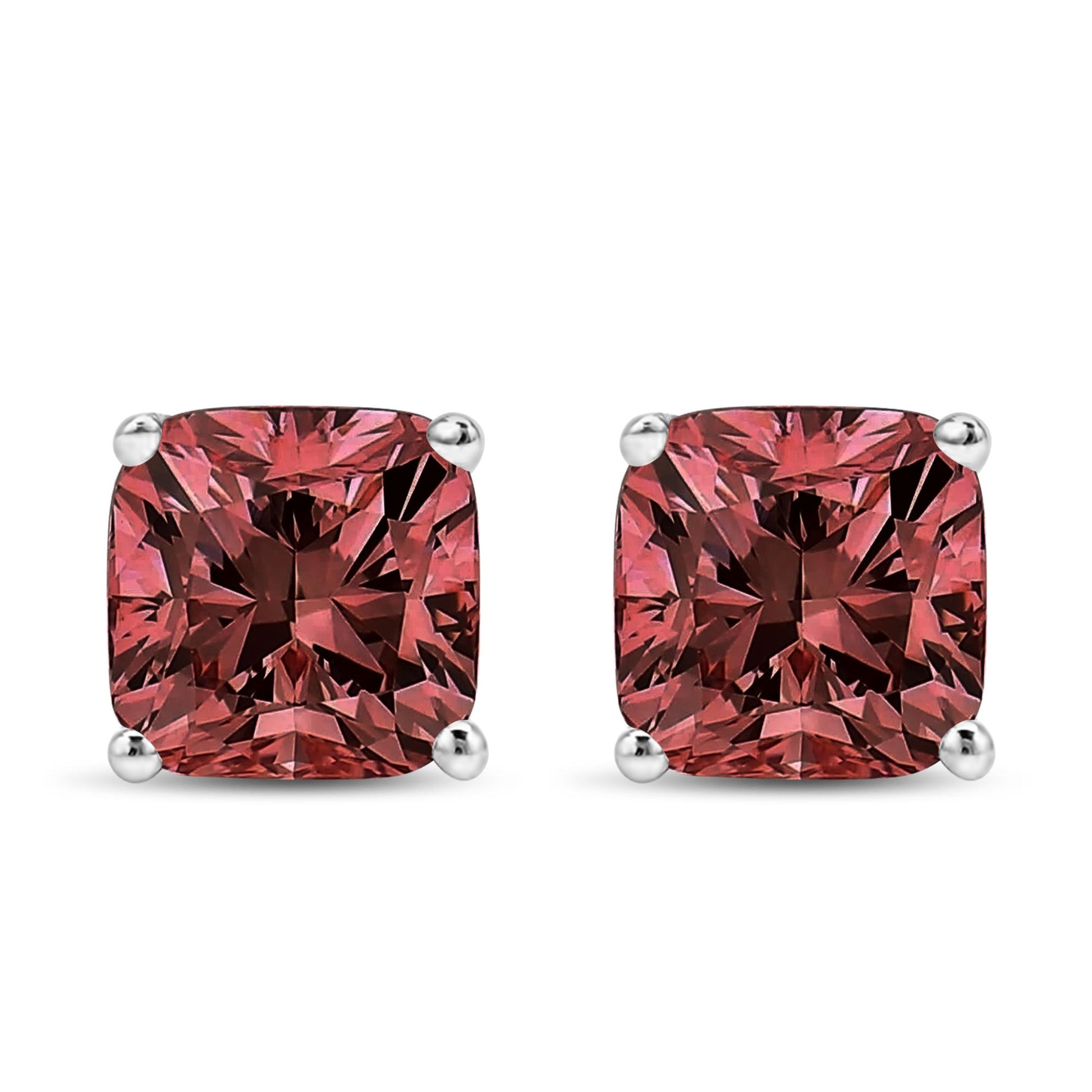 Front view of white metal stud earrings with cushion-shaped pink gemstones in four-prong settings.