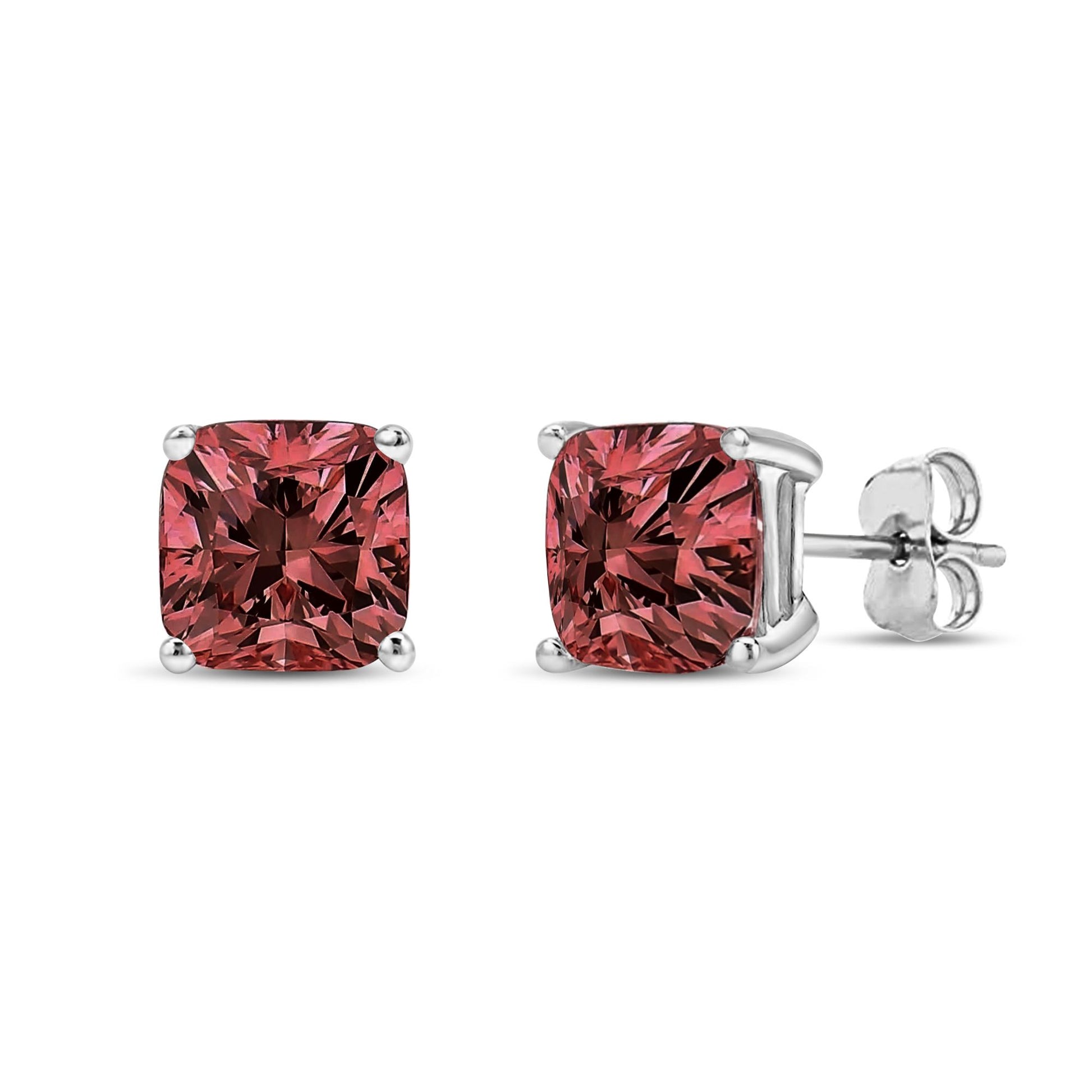 Front and angled side view of white metal stud earrings with cushion-shaped pink gemstones in four-prong settings.