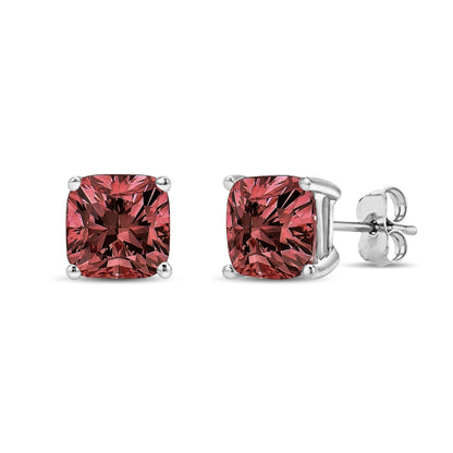 Front and angled side view of white metal stud earrings with cushion-shaped pink gemstones in four-prong settings.