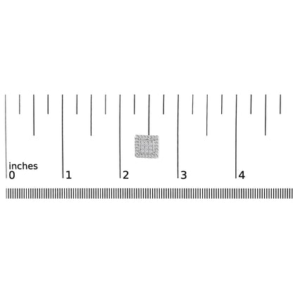 Square white metal stud earring with white round and princess shape gemstones, shown on a ruler for size reference, top-down angle.