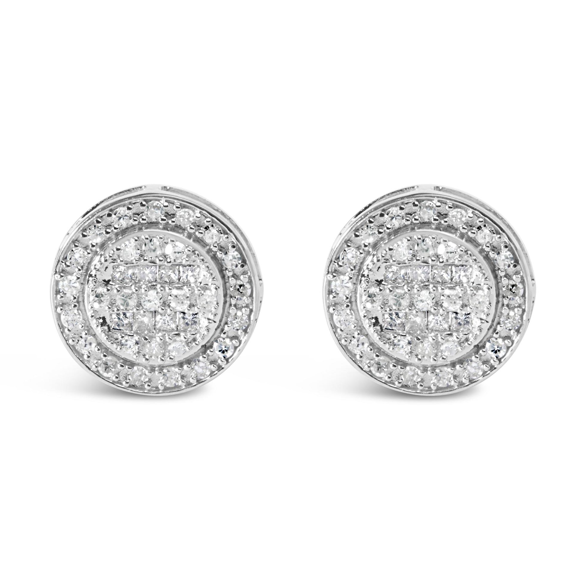 Front-facing view of white metal round stud earrings with central princess-shaped white gemstones in invisible setting, surrounded by two rows of round white gemstones in prong settings.
