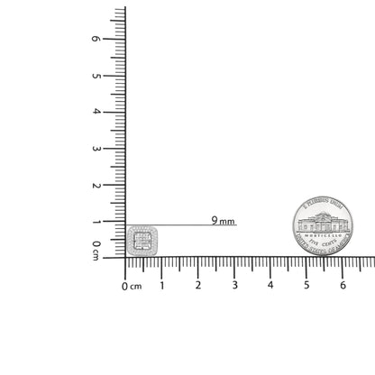 Close-up image of a white metal square earring with princess and round white gemstones, shown on a ruler and scale for size reference.