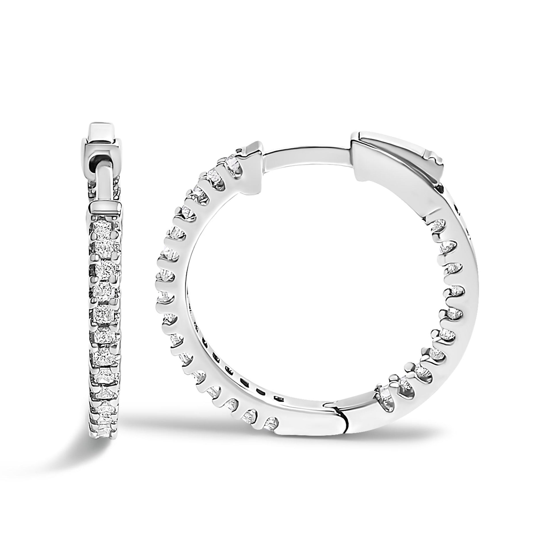 Pair of white metal hoop earrings with prong-set princess-shaped white gemstones, shown from front and side angles on a white background.