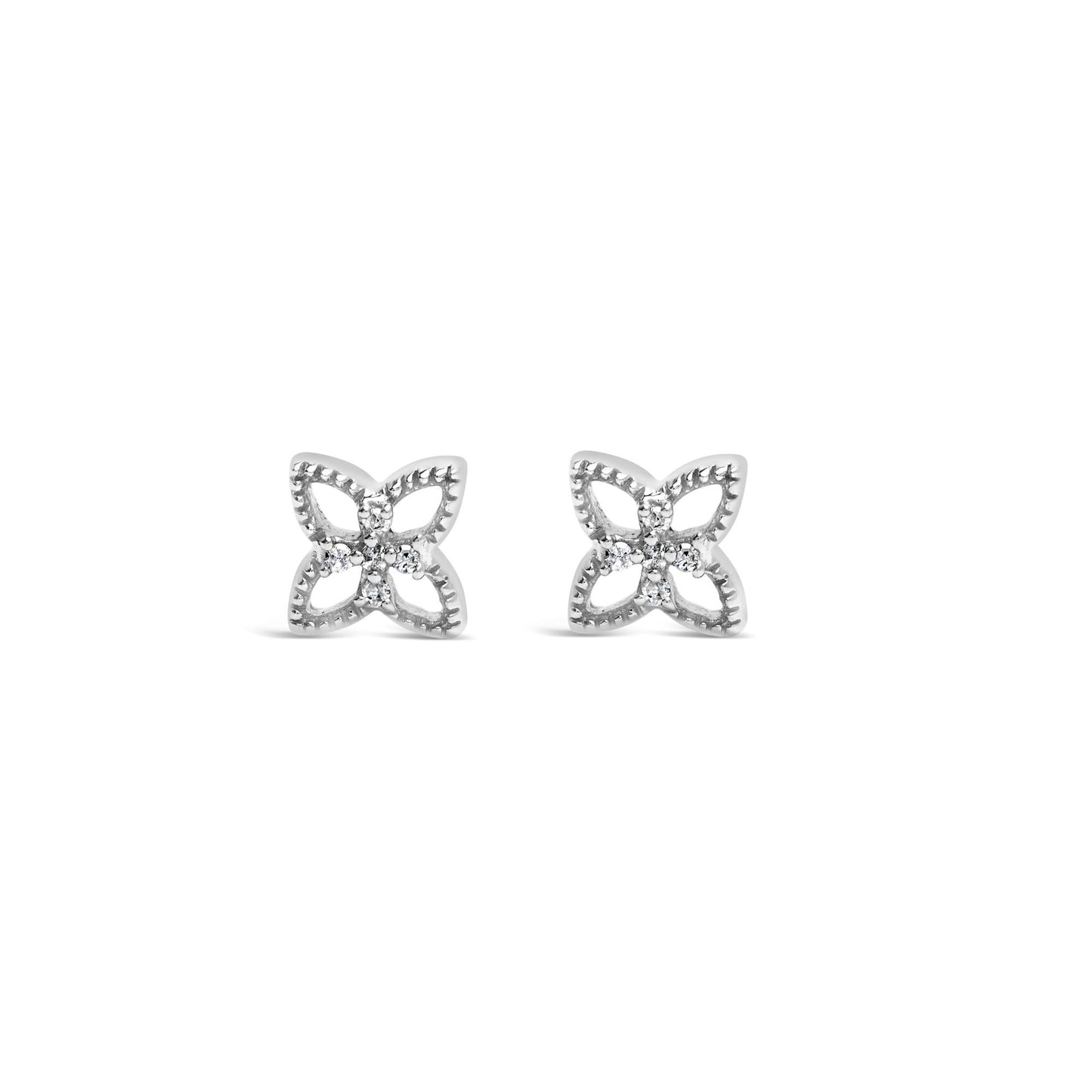 Pair of white metal earrings with a four-petal flower design, each petal outlined with textured edges and accented with round white gemstones in the center, shown from the front on a white background.