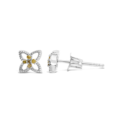 White metal stud earrings with flower-shaped design featuring round yellow gemstones in prong settings, shown from front and side angles.