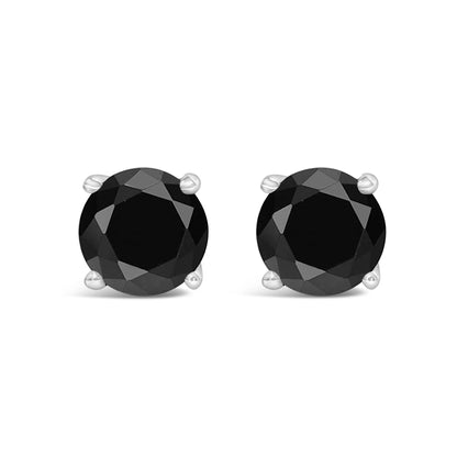 Front view of white metal stud earrings featuring round black gemstones in four-prong settings.