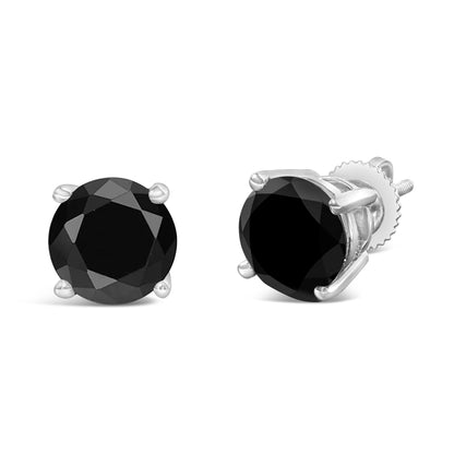 Pair of white metal stud earrings with round black gemstones in 4-prong settings, shown from front and side angles on a white background.