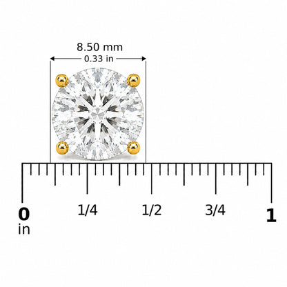 Close-up front view of a round white gemstone stud earring with four yellow prongs, shown on a measuring scale.