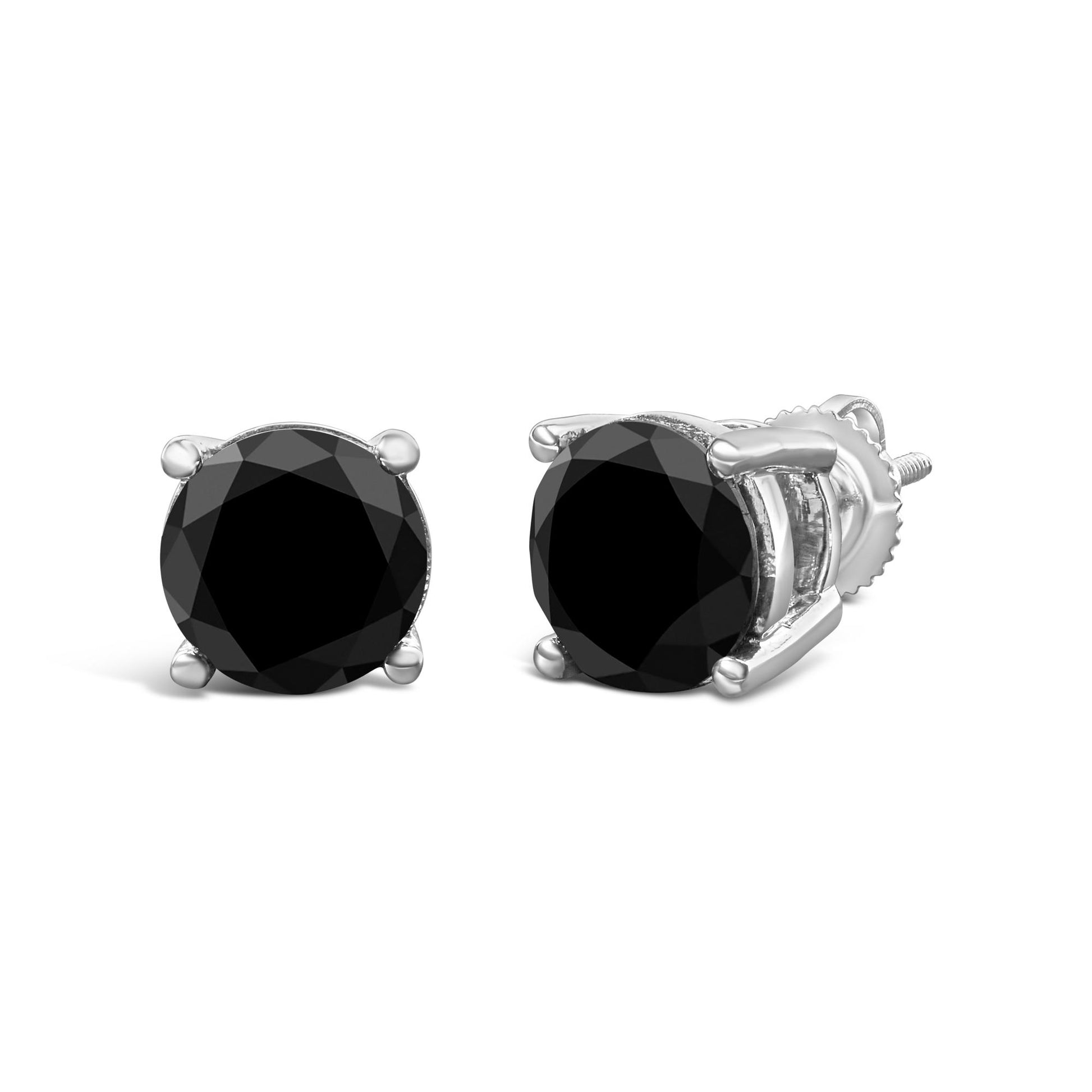 Pair of white metal stud earrings with round black gemstones in four-prong settings, shown from front and side angles.