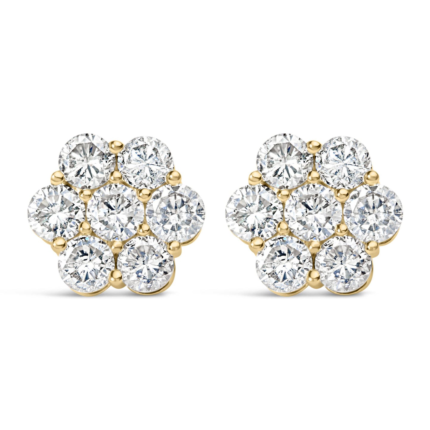 Front angle view of a pair of yellow metal earrings shaped like flowers, each featuring cluster of round white gemstones in prong settings.