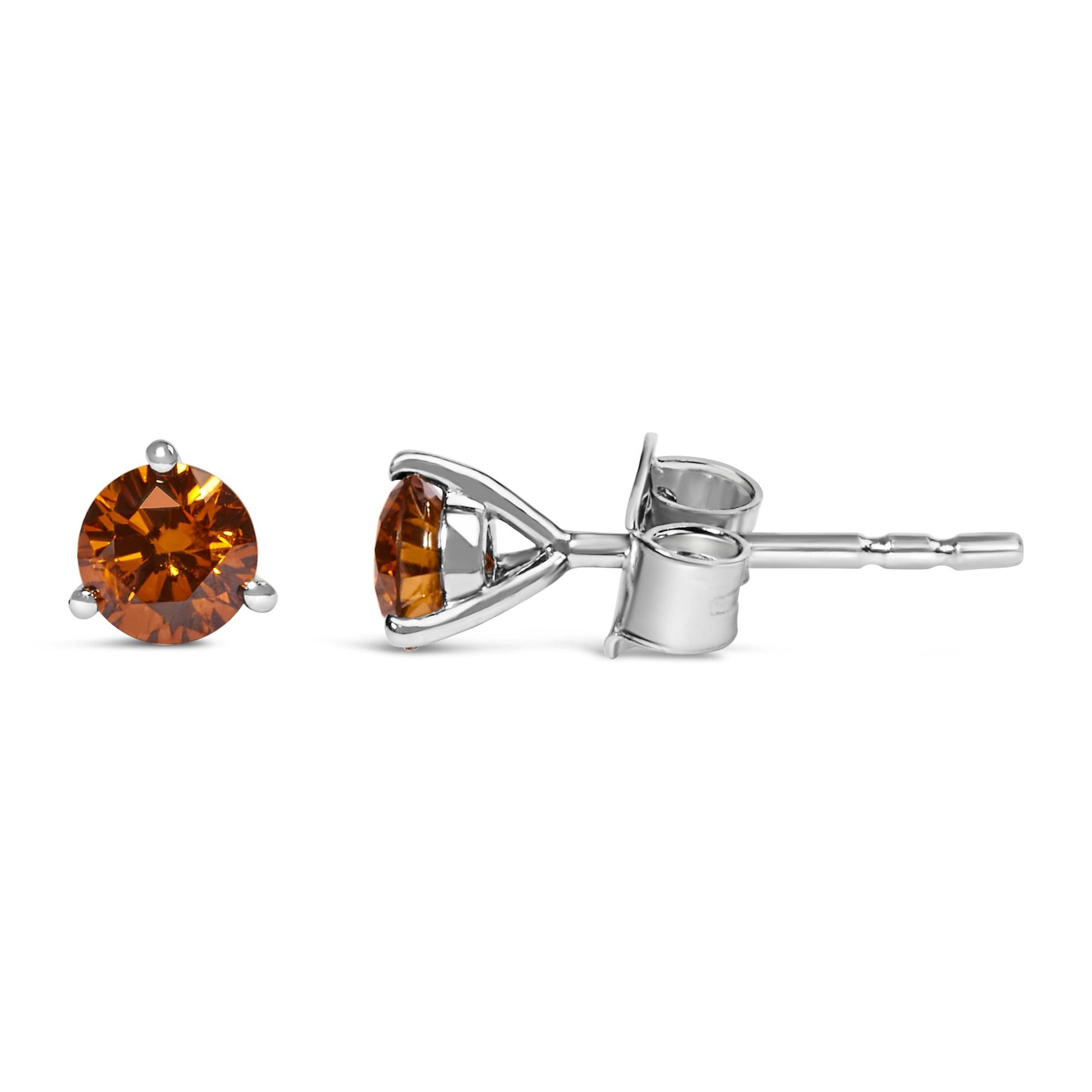 Pair of white metal stud earrings with round orange gemstones in a three-prong setting, shown from front and side angles against a white background.