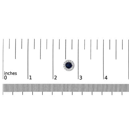 White round stud earring with a central blue gemstone surrounded by smaller white gemstones, shown on a ruler scale from a top-down angle.