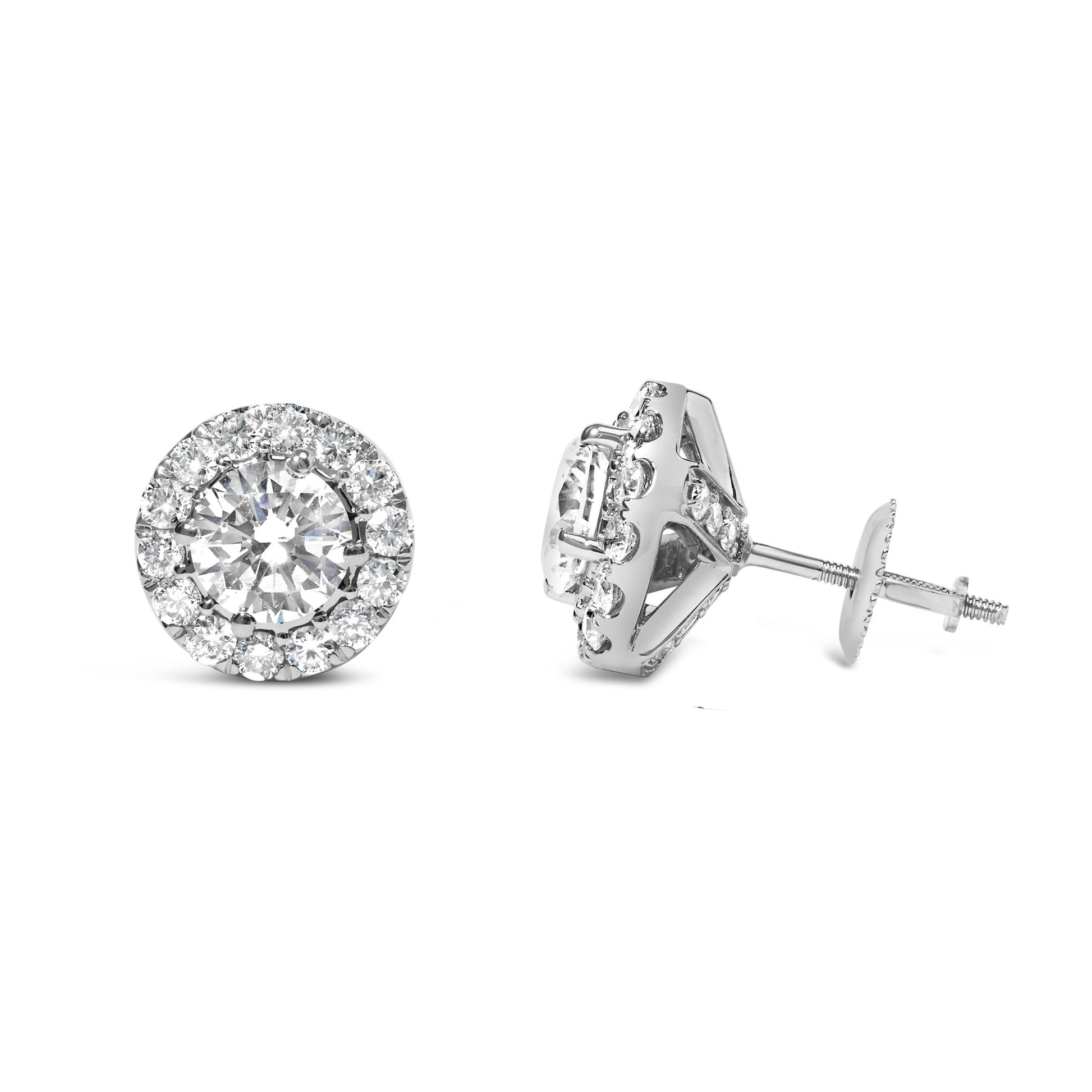 Pair of white metal stud earrings with round white gemstones in prong settings, shown from front and side angles.