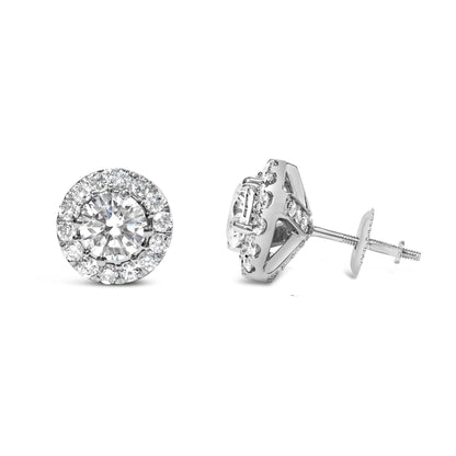 Pair of white metal stud earrings with round white gemstones in prong settings, shown from front and side angles.